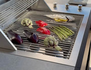 Q-boo OVO GS gasbarbecue met groenten op RVS grillrooster