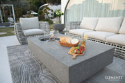 Elementi Metropolis Space Grey bio-ethanol vuurtafel in een buitenlounge